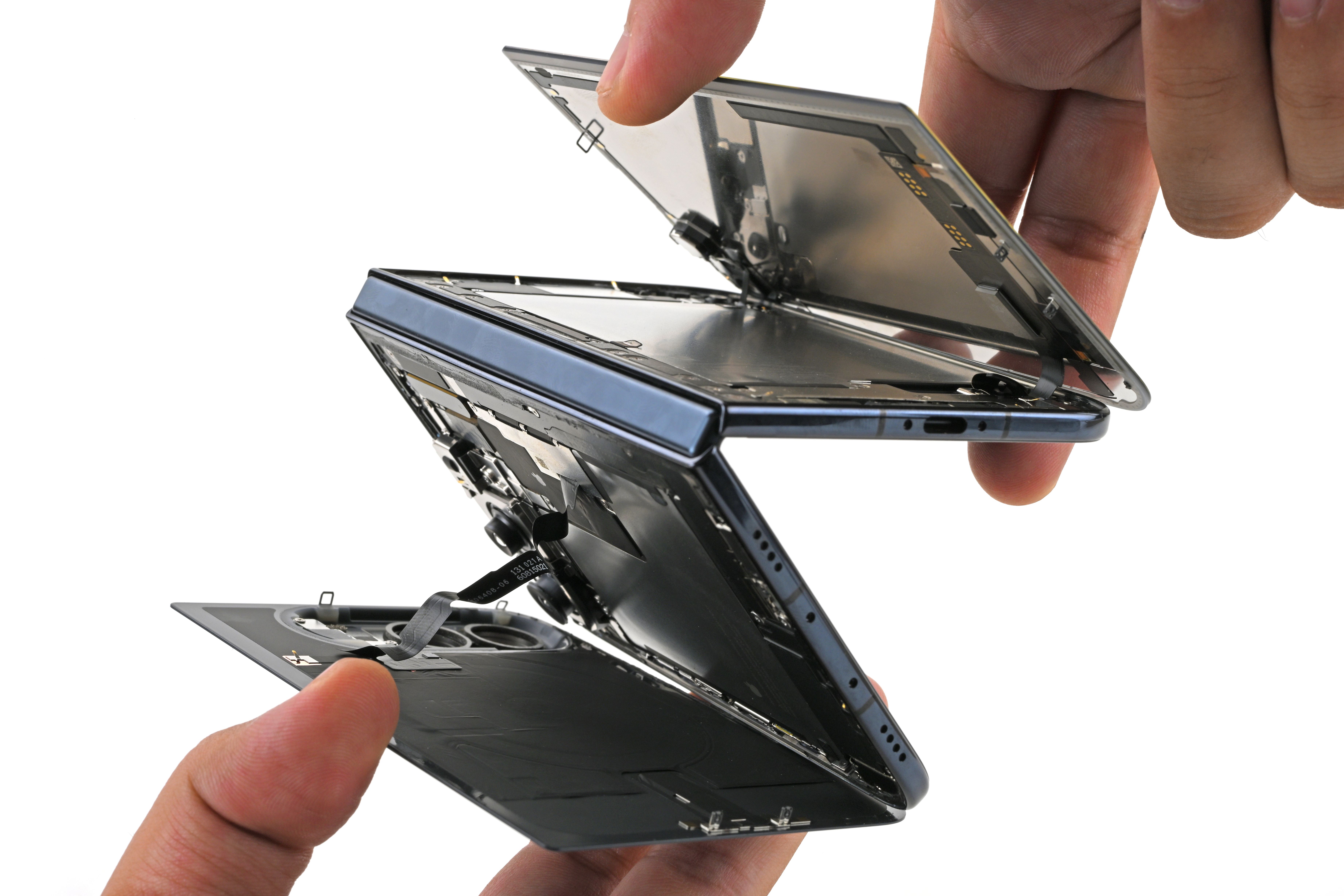 Some iPhone Duo Models Are Breaking. iFixit’s Teardown Might Explain Why — Wired, Singapore Business news